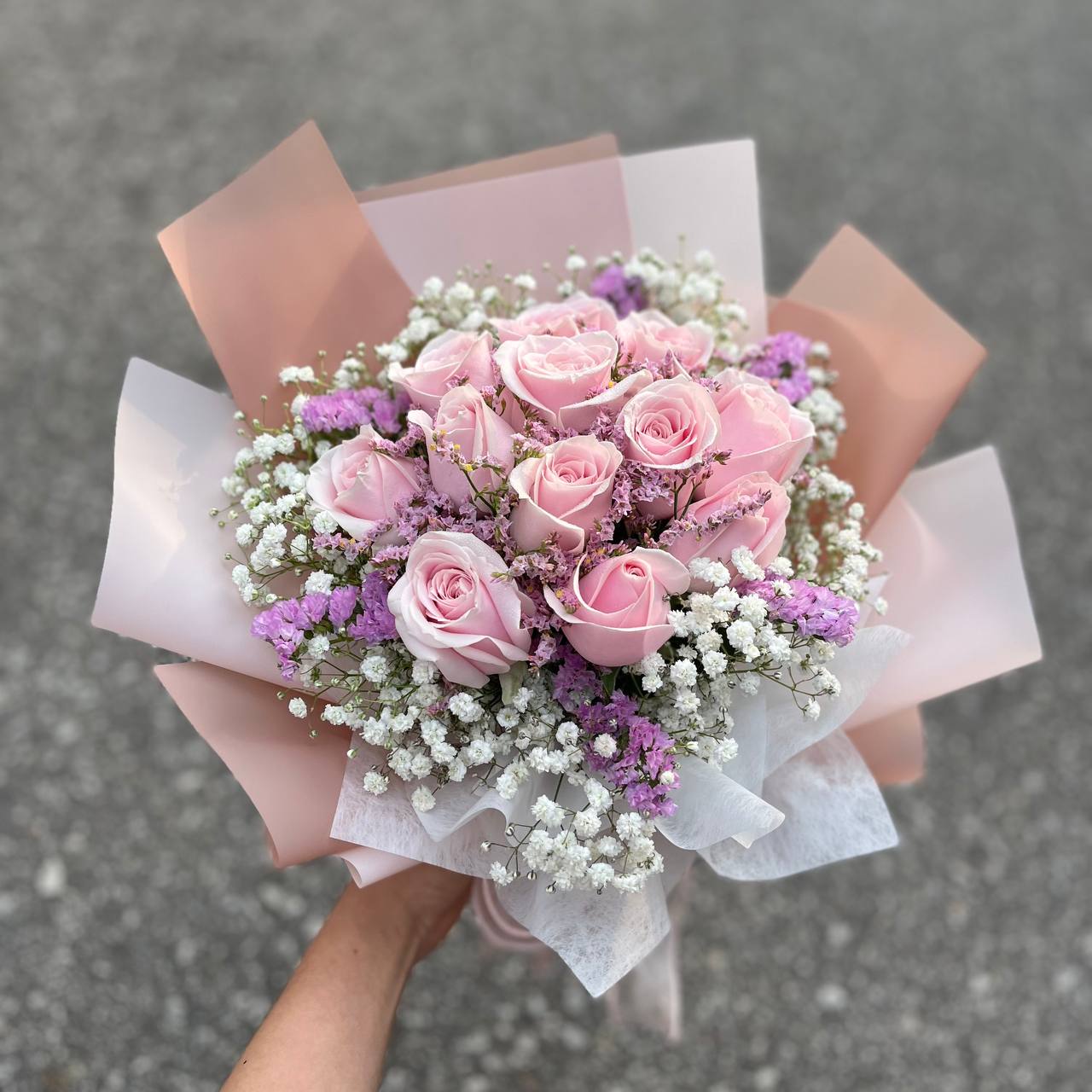 Pretty in pink- 12 pink roses & purple fillers